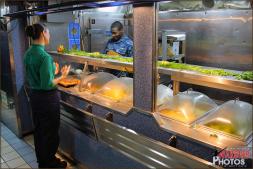 One of the many food serving stations in the massive Mess Hall section of the USS Abraham Lincoln Aircraft Carrier - Photo by Britt Dietz One of the many food serving stations in the massive Mess Hall section of the USS Abraham Lincoln Aircraft Carrier - Photo by Britt Dietz