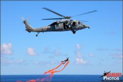 A Sikorsky MH-60S Knighthawk from HSC-12 'Golden Falcons' lifts a Navy diver up after performing a mock Search and Rescue demo during the Air Power Demo on the USS Abraham Lincoln. - Photo by Britt Dietz A Sikorsky MH-60S Knighthawk from HSC-12 'Golden Falcons' lifts a Navy diver up after performing a mock Search and Rescue demo during the Air Power Demo on the USS Abraham Lincoln. - Photo by Britt Dietz